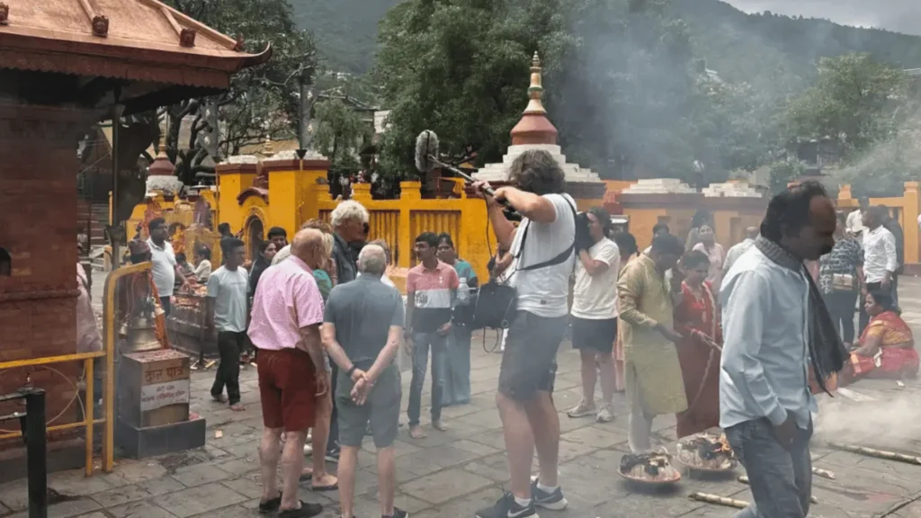 Local Film Crew coordinating with international crew filming in cultural aspects