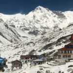 Solar-powered teahouse lodges at Gokyo village in the Khumbu region, a key acclimatisation and base location for high altitude filmmaking in Nepal, with Cho Oyu massif dominating the background.