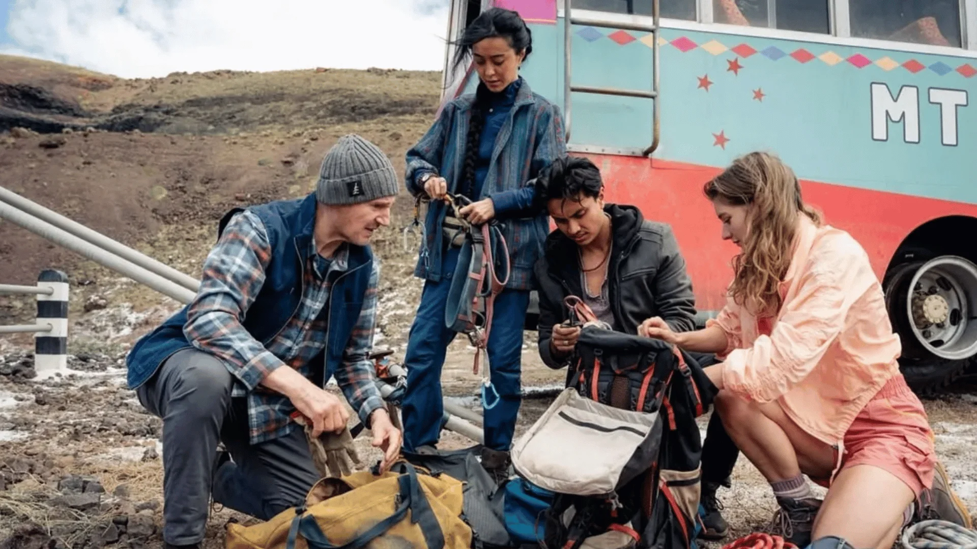 Film crew preparing gear and equipment for a high-altitude film shoot in Nepal, an example of coordinated logistics covered under film insurance and liaison officer requirements in Nepal.