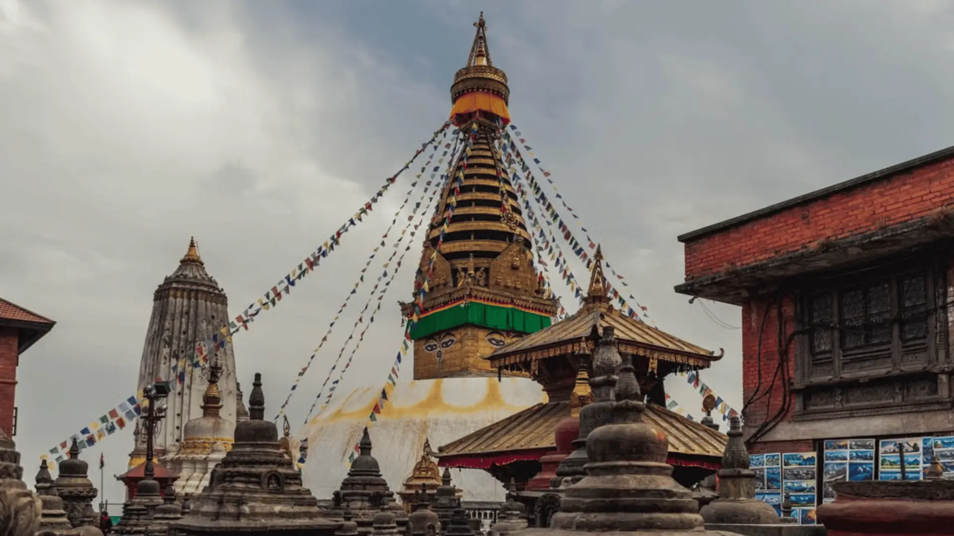 Swayambhunath stupa, a UNESCO World Heritage Site in Kathmandu Valley, with its golden spire, painted Buddha eyes, and prayer flags.
